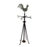 A Victorian copper and wrought iron weathervane with a cockerel 150cm.; 59ins high