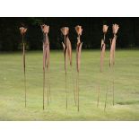 Modern Sculpture: A set of twelve wrought iron tulips with lawn spikes modern 144cm.; 57ins high