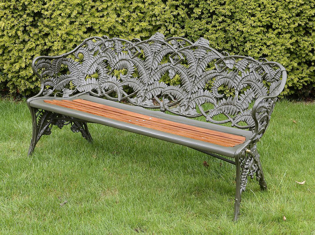 Garden Seat: A Coalbrookdale Fern and Blackberry pattern cast iron seatstamped Coalbrookdale and