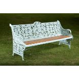 Garden Seat: A Coalbrookdale Passion Flower pattern cast iron seat circa 1870stamped with