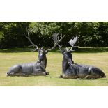 Garden Statuary: A pair of cast iron deer comprising a Red and Fallow deerlate 19th/early 20th