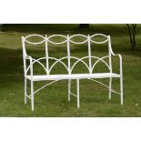 Garden Furniture: A Regency wrought iron seat,19th century140cm long