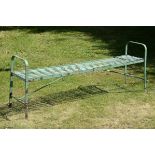 Garden Furniture: An unusual wrought iron strapwork bench,late 19th century 180cm long,