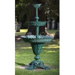 Garden Furniture: A rare and unusual Victorian cast iron plant stand with three tiers;200cm high