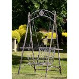 Garden Furniture: A wrought iron swing seat,French, mid 20th century 230cm high by 150cm wide