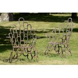 Garden Furniture: A pair of unusual garden wrought iron armchairs,early 20th century constructed