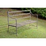 Garden Furniture: A Regency reeded wrought iron seat,early 19th century160cm long