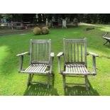 Garden Furniture: A pair of similar smaller teak steamer chairs,circa 1920with metal labels