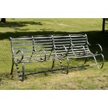 Garden Furniture: A wrought iron strapwork seat,late 19th century 213cm long