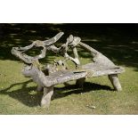 Garden Furniture: A carved rootwood seat, probably Eucalyptus,2nd half 20th century 160cm long