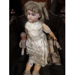 Large porcelain head doll, teddy and doll