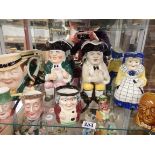 Collection of Toby jugs etc