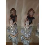 2 x Nao figures of girl with rabbit (1 damaged)