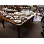 Wind out extending mahogany dining table fully ext. 12ft so would 2 -3 more leaves.