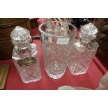 Collection of decanters and vase