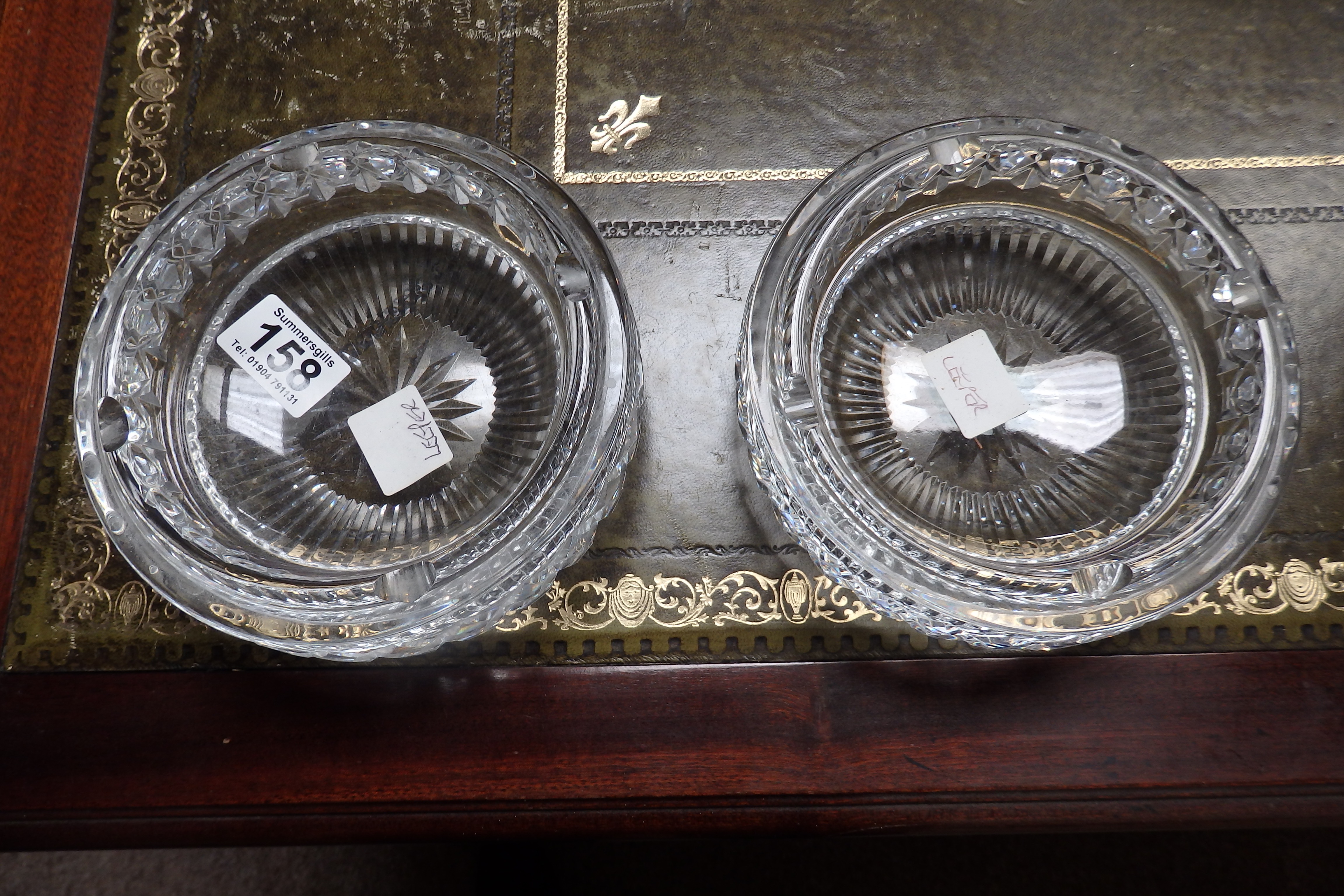 Pair of cut glass ashtrays