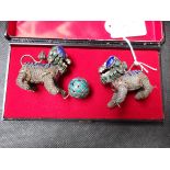 Silver and enamel Chinese lions