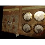 4 x pope coins in case