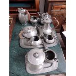 collection of hammered pewter items