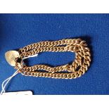 9ct gold double curb heart bracelet 40g