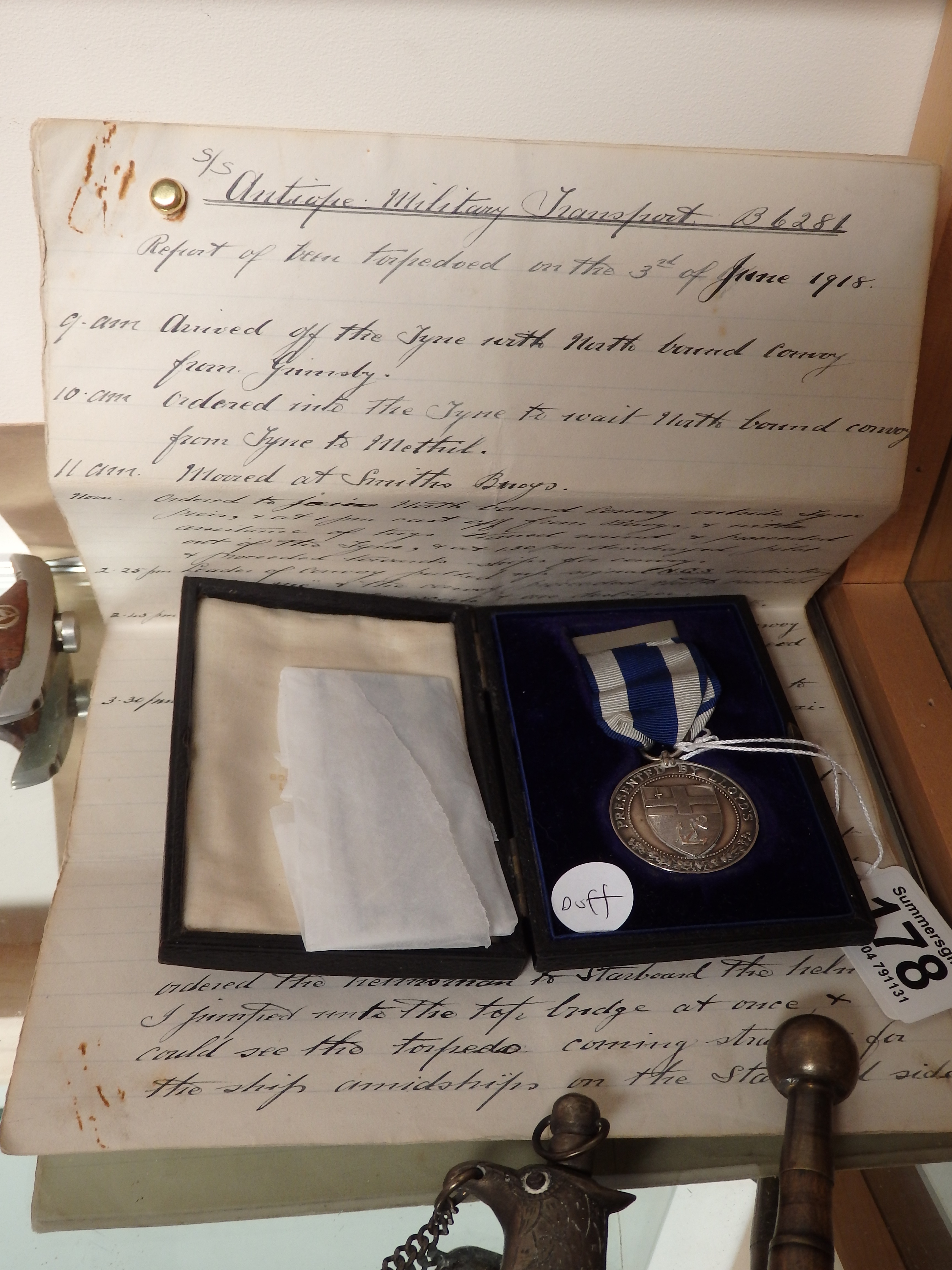 Lloyds meritorious medal and paperwork.....Captain John Arthur Streeting SS Antiop 3rd june 1918