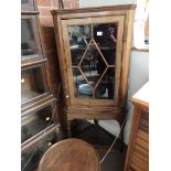 Antique oak corner cupboard on stand