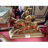 Pair of brass cavalier style door stops (Victorian)