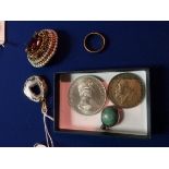 Brooches and coin