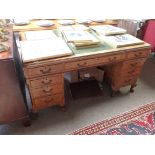 Antique walnut pedestal desk