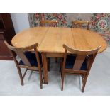 Oak dining table and chairs