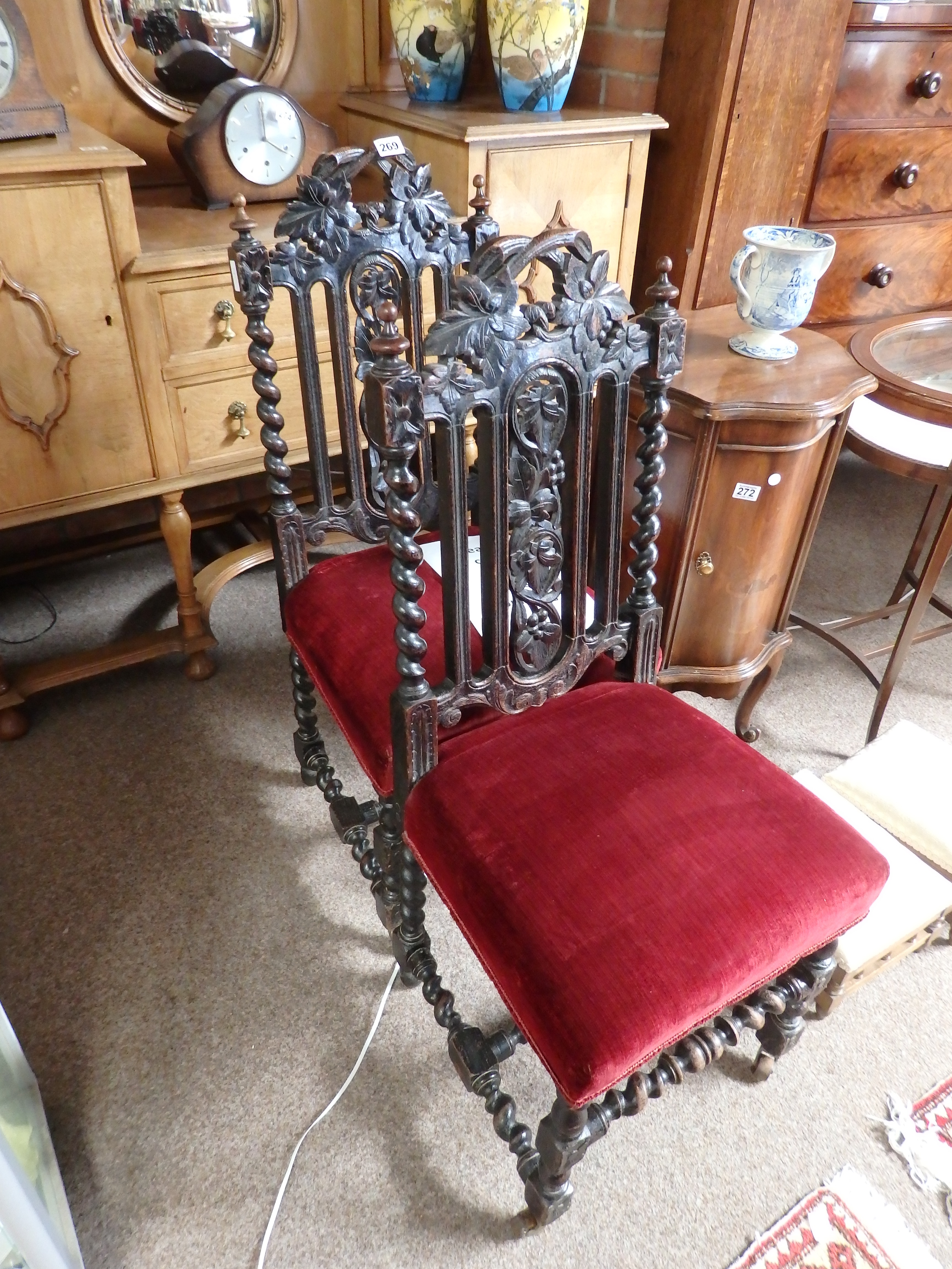 Pair of oak carved hall chairs