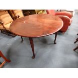 Mahogany dining table with pad feet