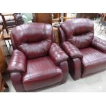 2 red leather armchairs