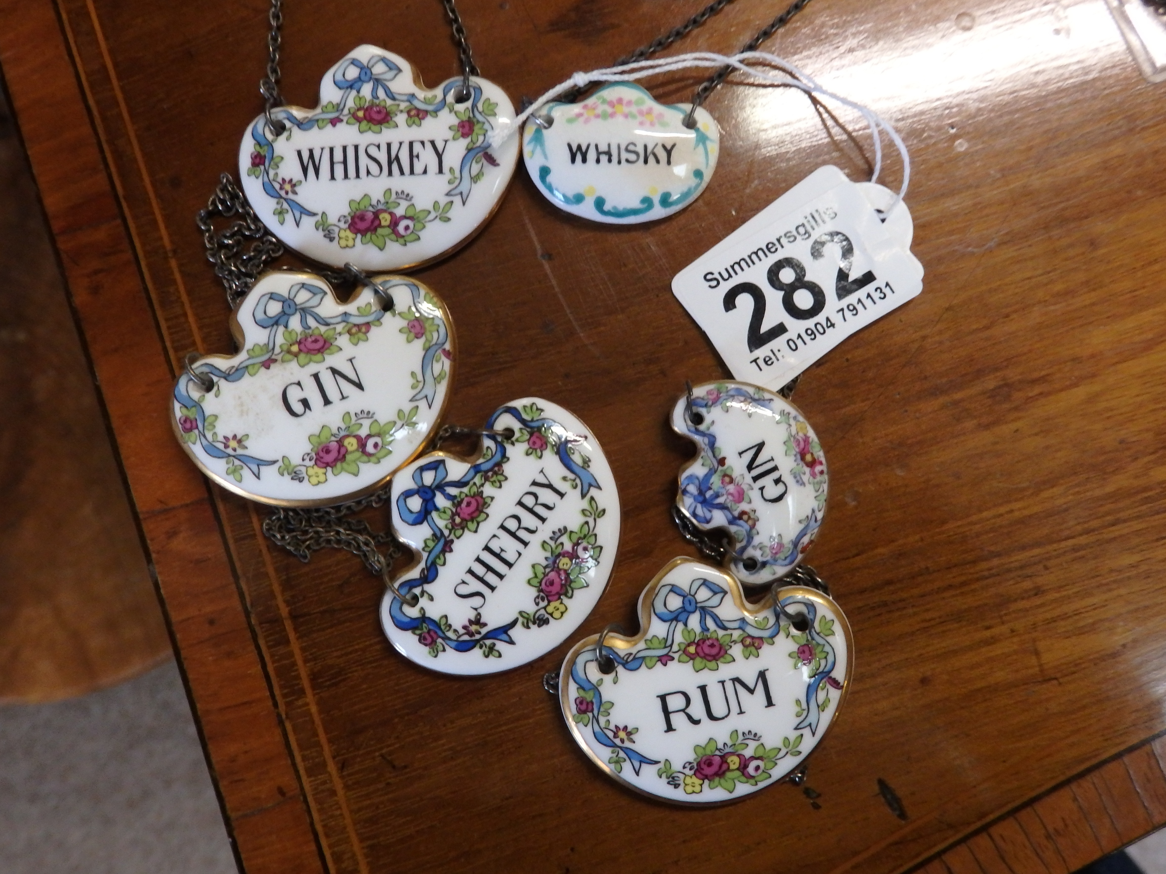 6 x Antique silver bottle labels