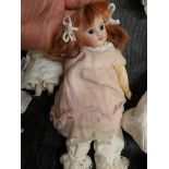 Bisque face doll marked Paris 31cm ht