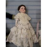 Bisque face doll 24cm ht