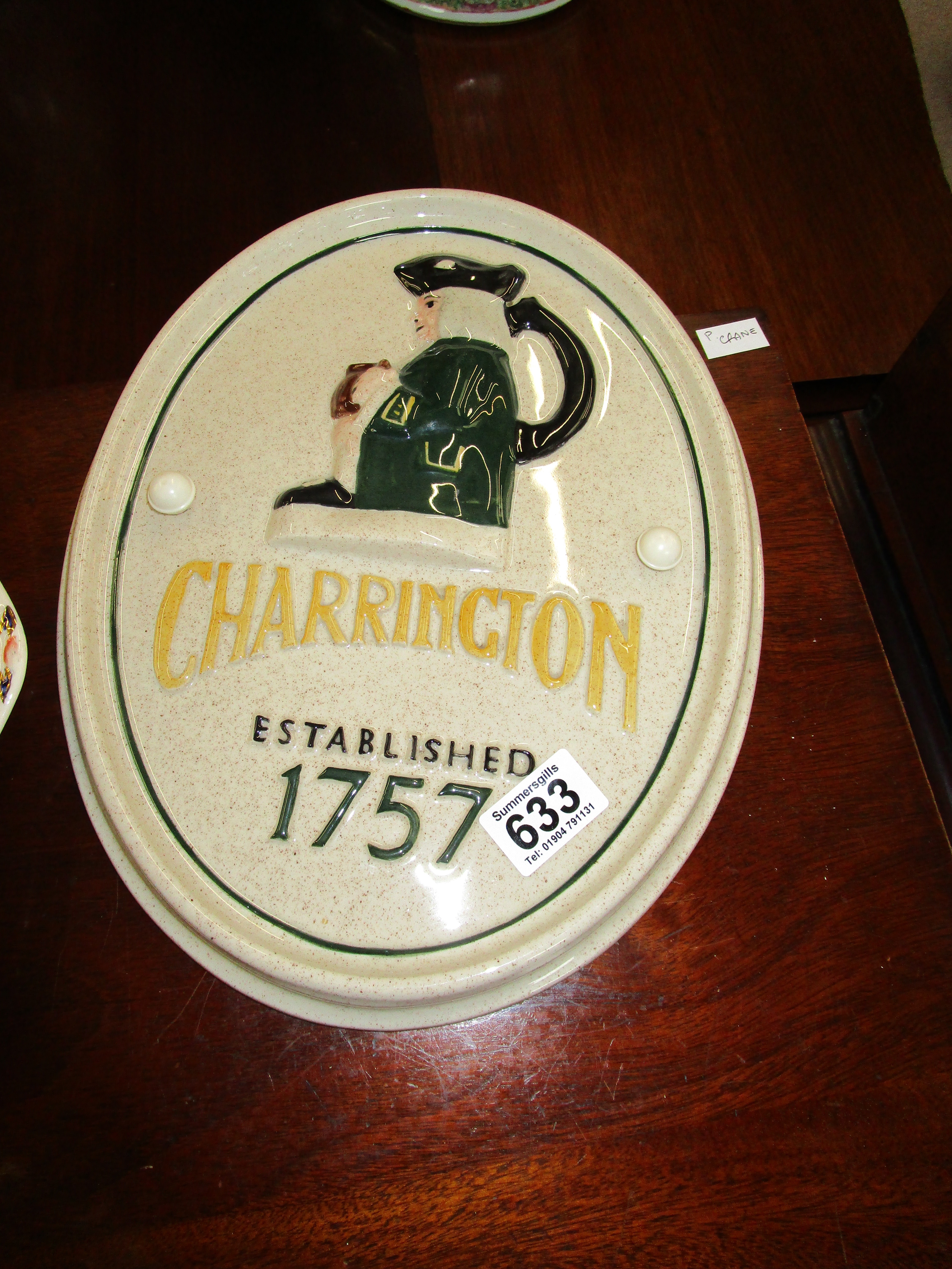 Charrington wall plaque
