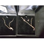 2 9ct gold necklaces and earrings