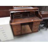 Oak roll top desk and sewing machine