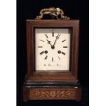 HENRY MARC DE PARIS, AN EARLY 19TH CENTURY FRENCH ROSEWOOD AND SATINWOOD INLAID CARRAIGE CLOCK