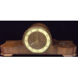 A 20TH CENTURY GERMAN WALNUT VENEERED MANTLE CLOCK Having a circular dial with a white chapter ring,