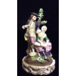 'THE STOCKING MENDERS', A RARE 18TH CENTURY DERBY PORCELAIN GROUP A seated maiden wearing a pink