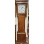 A GEORGIAN OAK AND CROSSBANDED LONGCASE CLOCK The painted dial with a Roman numeral chapter ring,