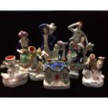 STAFFORDSHIRE, A COLLECTION OF 19TH CENTURY POTTERY FIGURES Including a maiden and beau looking