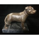 A BRONZE SCULPTURE OF A BULL TERRIER Raised on a black marble base. (h 13cm)