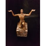 A BRONZE STATUE OF A MEDITATING MALE NUDE In a sun worshipping position. (h 19cm)