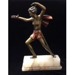 A 20TH CENTURY ART DECO SPELTER FIGURINE A lady fencer, cold painted with a gilt body and red shorts