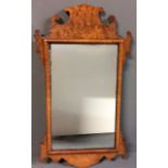 A GEORGIAN STYLE BURR WALNUT RECTANGULAR PIER MIRROR Topped with a scrolled finial, along with a