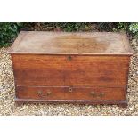 AN 18TH CENTURY OAK MULE CHEST With a hinged lid over a single drawer, raised on bracket feet. (h