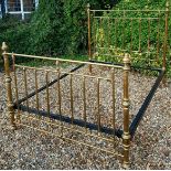 A VICTORIAN STYLE KING SIZE BRASS BED The circular section frame with shaped finials. (w 153cm/5ft)